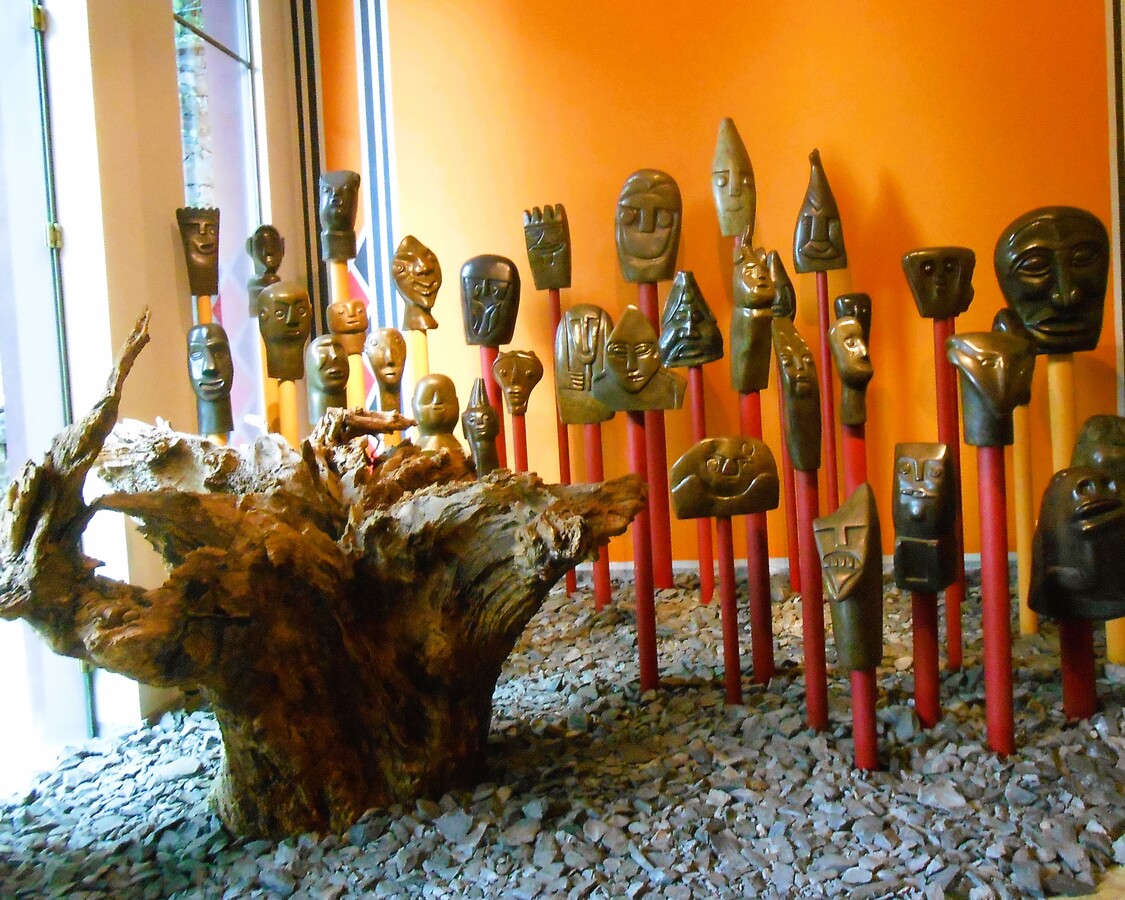 Arrangement of pile dwellings masks in a private collection in Madeira