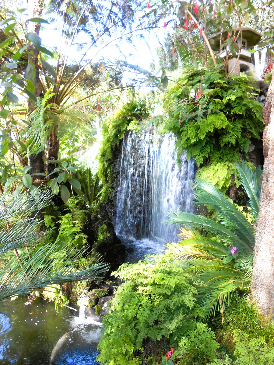 The English Garden with a waterfall in Monte Palace